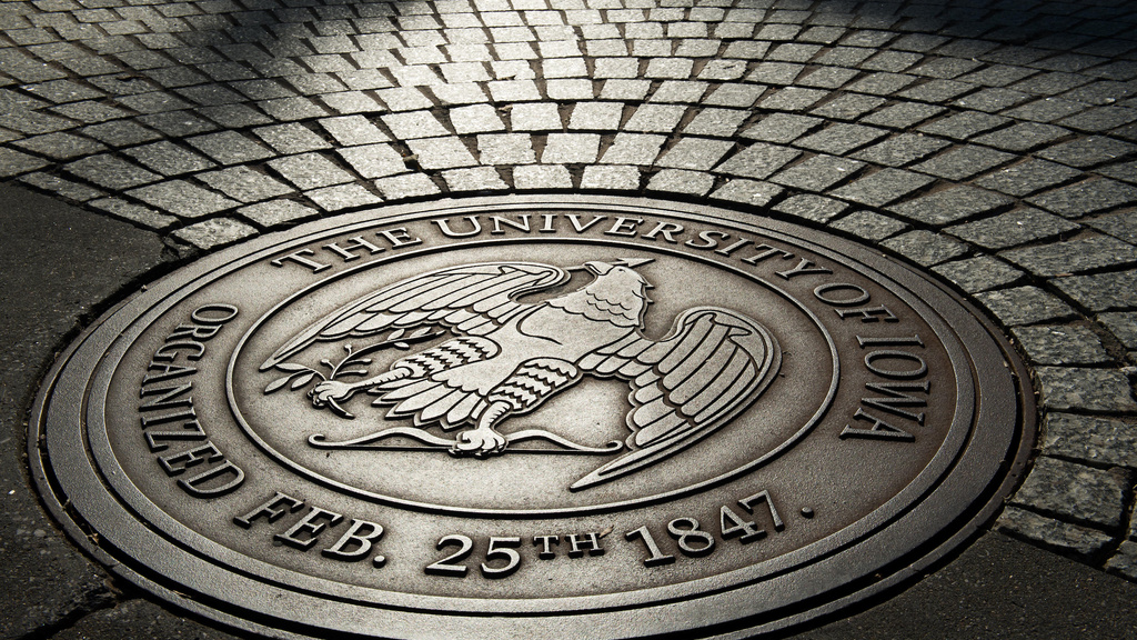 University of Iowa seal etched into pentacrest walkway
